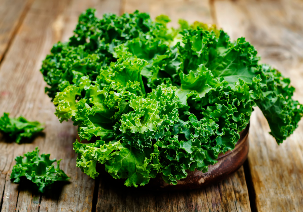bowl of kale on wood table
